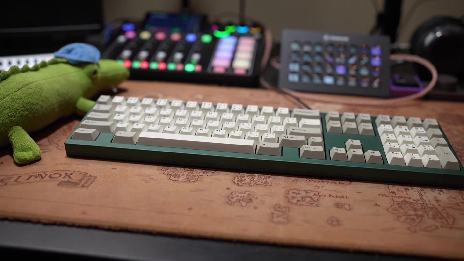 Simon's desk, with Ron the alligator sitting beside the keyboard